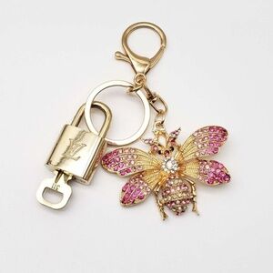 100% Auth Louis Vuitton Lock & Key with unbranded Bagcharm, Keycharm, Keychain
